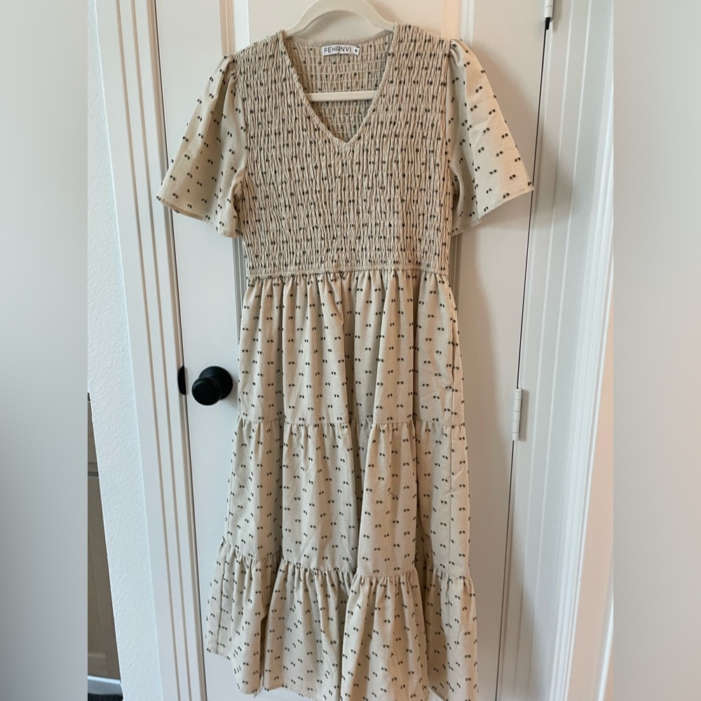 Elegant Cream Midi Dress with Patterned Design